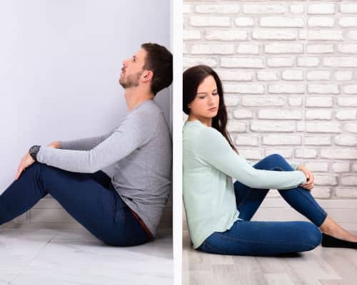 A man and woman sitting up against the same wall from different rooms. Both are sad, indicating they are no longer a couple. This picture is part of the article, "Does God Really Forgive Divorce?"